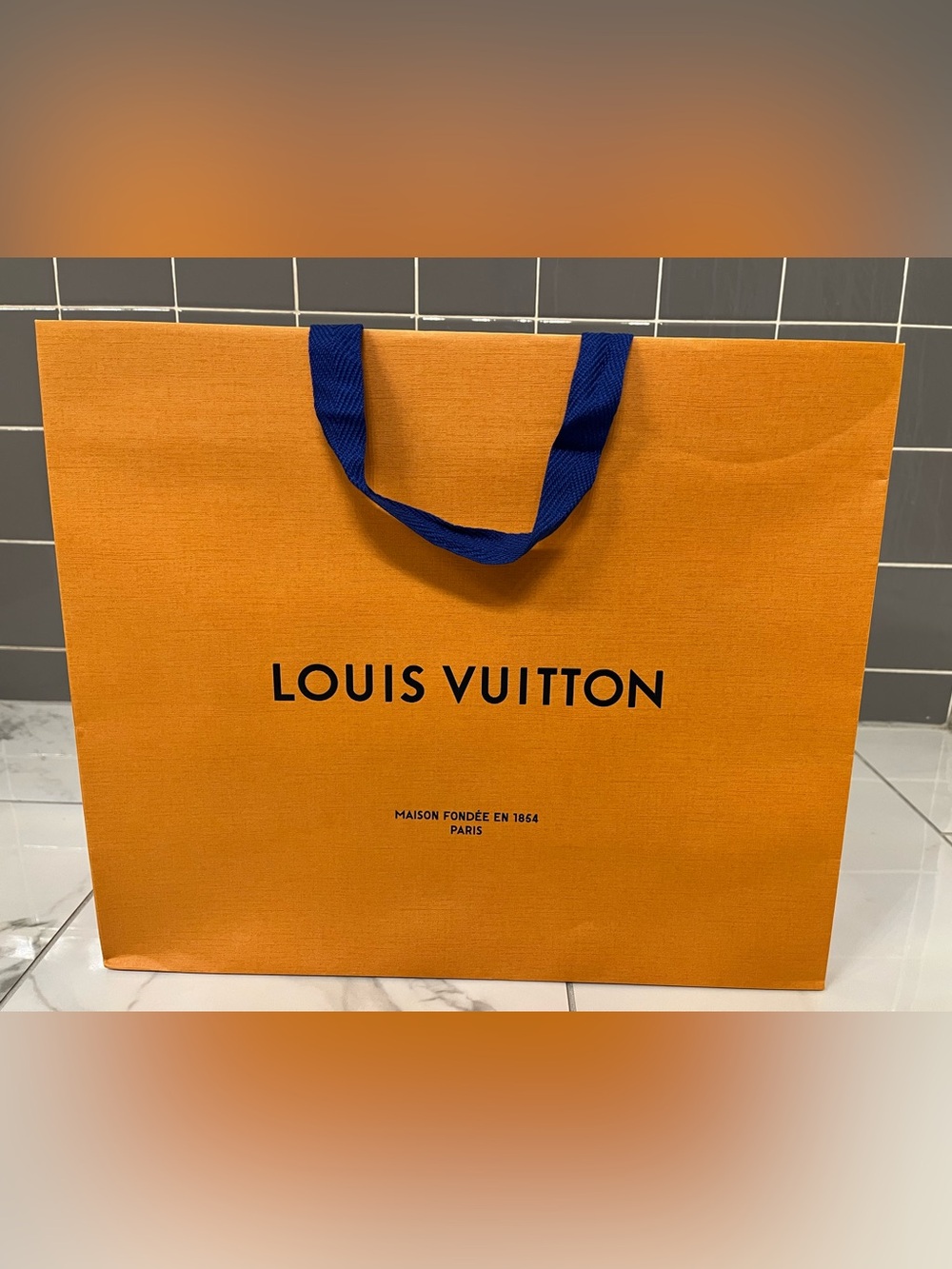 Authentic Louis Vuitton Orange Tote with Black Logo